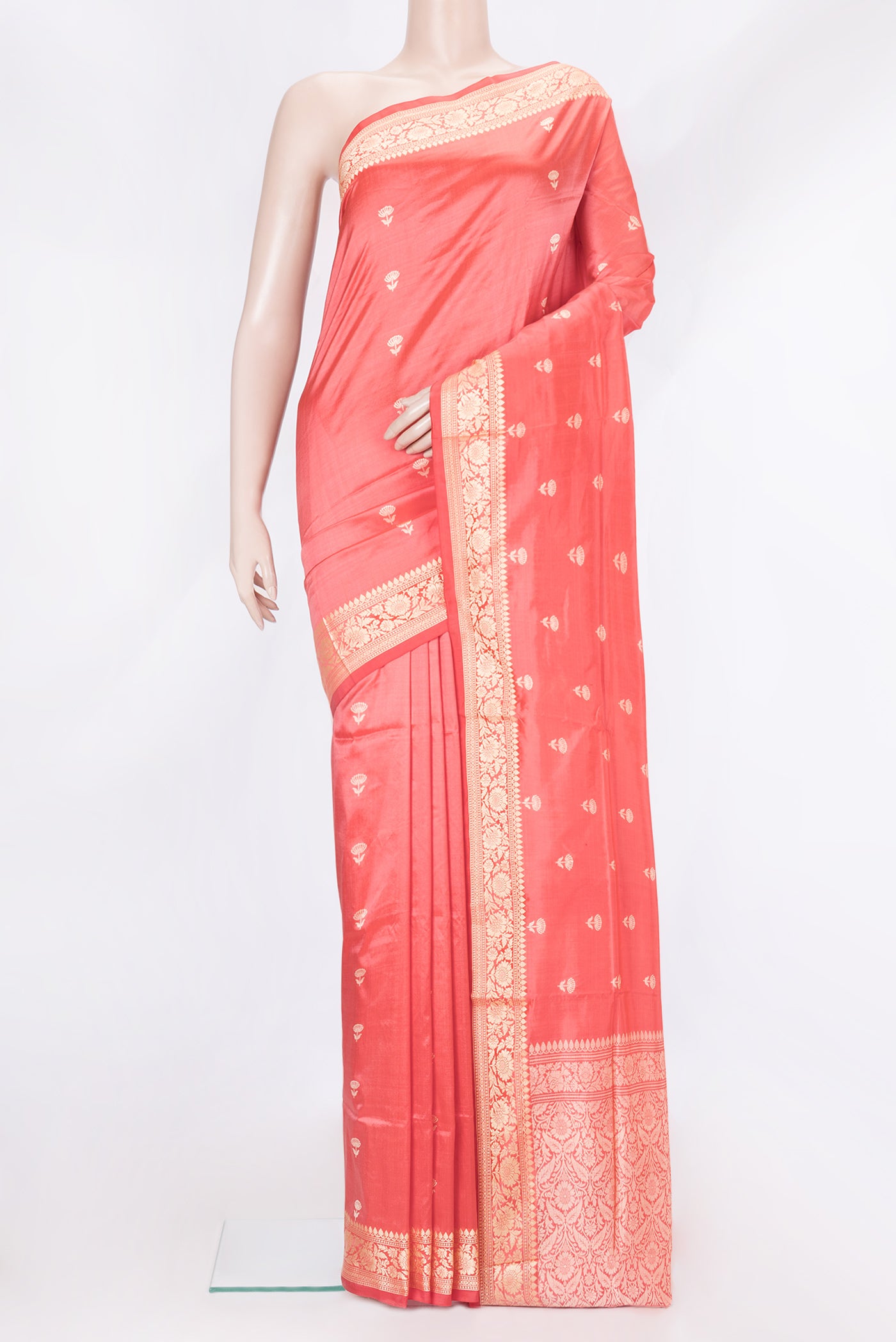 Peach Dual Tone Banarasi Silk Saree with Thread Butta on the body and Thread Border.  displayed on a mannequin
