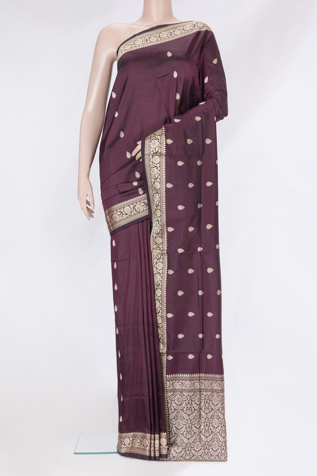 Coffee Brown Banarasi Silk Saree with Thread Butta on the body and Thread Border.  displayed on a mannequin