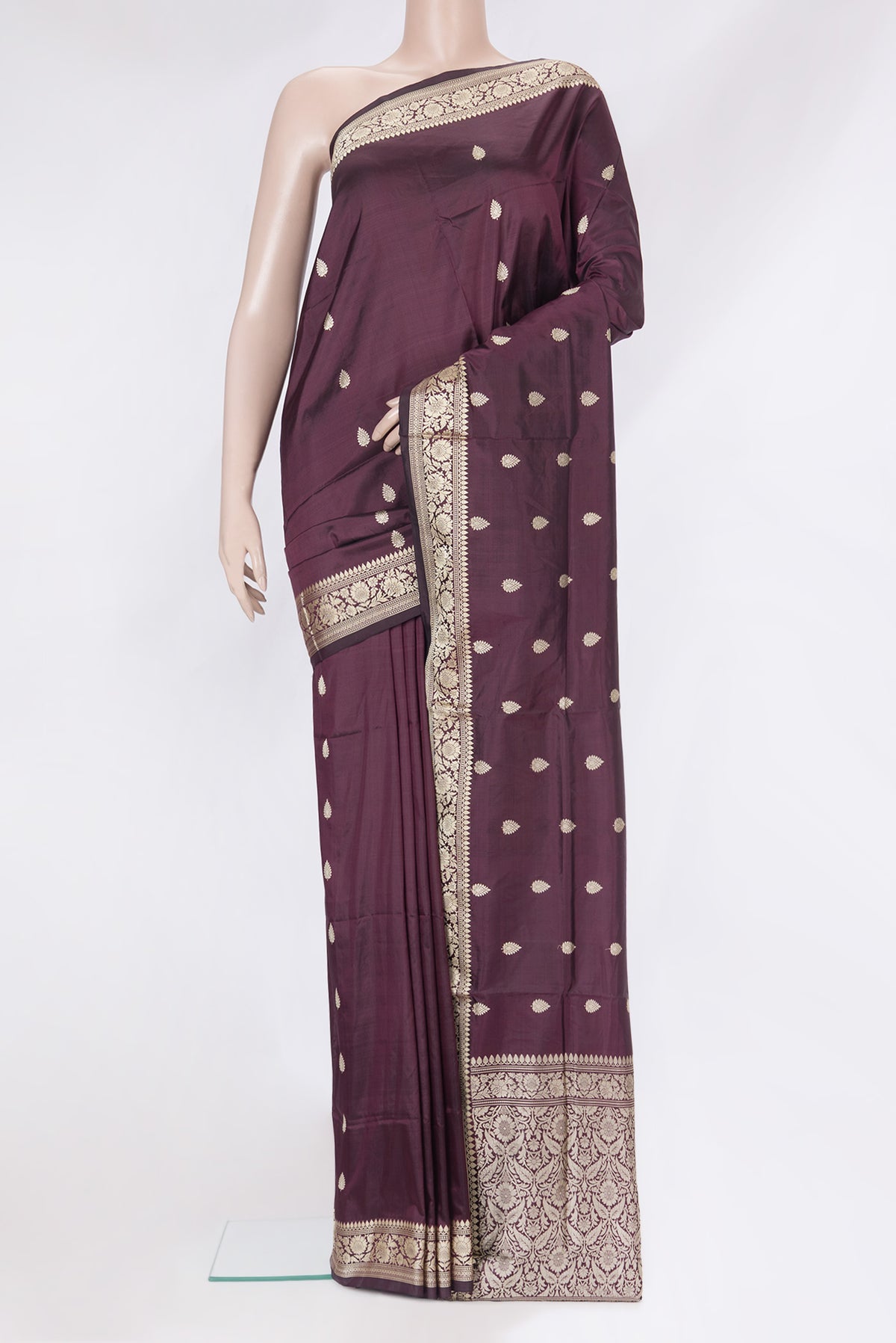 Coffee Brown Banarasi Silk Saree with Thread Butta on the body and Thread Border.  displayed on a mannequin