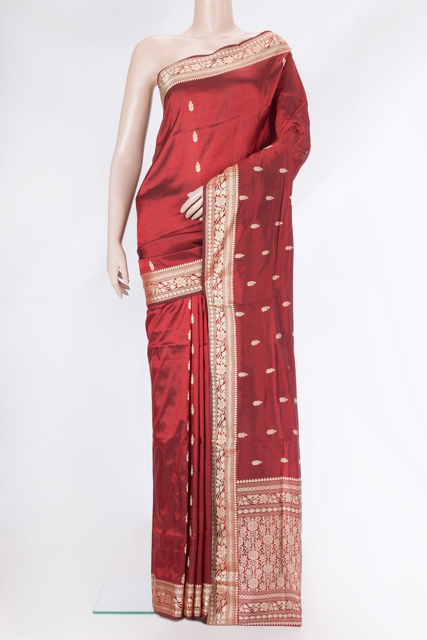 Maroon Dual Tone Banarasi Silk Saree with Thread Butta on the body and Thread Border.  displayed on a mannequin