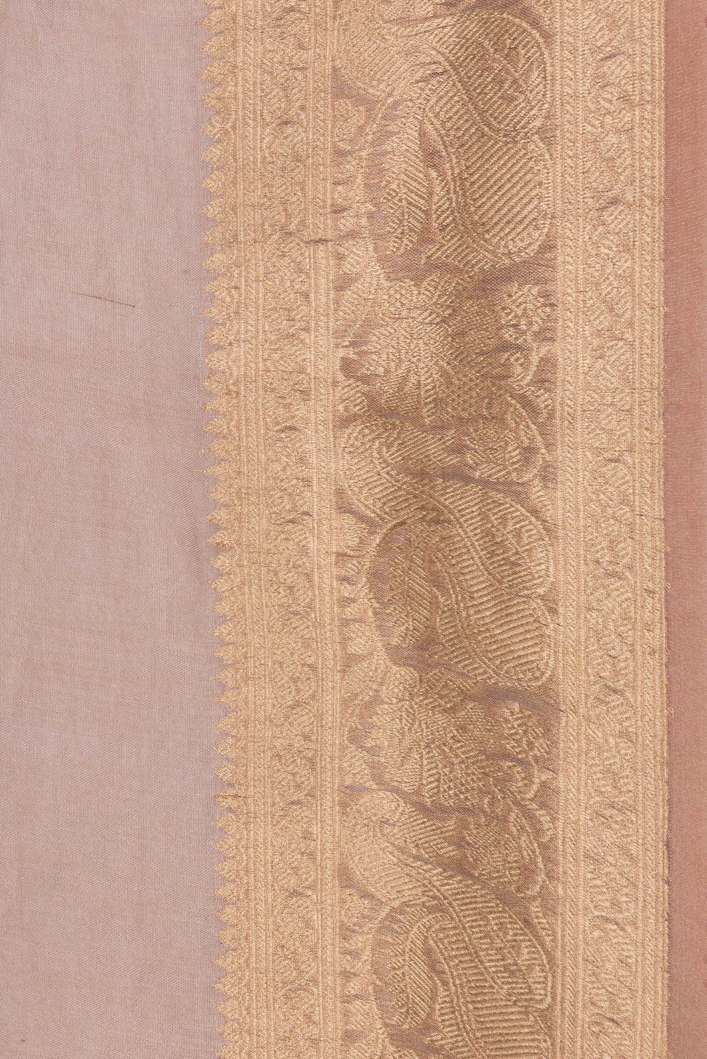 Border image of Rose Gold Dual Tone Organza Silk Saree with Zari Butta on the body and Zari Border. 