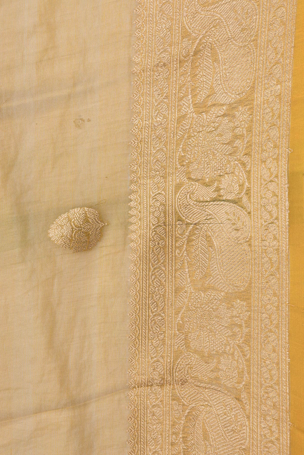 Border image of Gold Dual Tone Organza Silk Saree with Zari Butta on the body and Zari Border. 