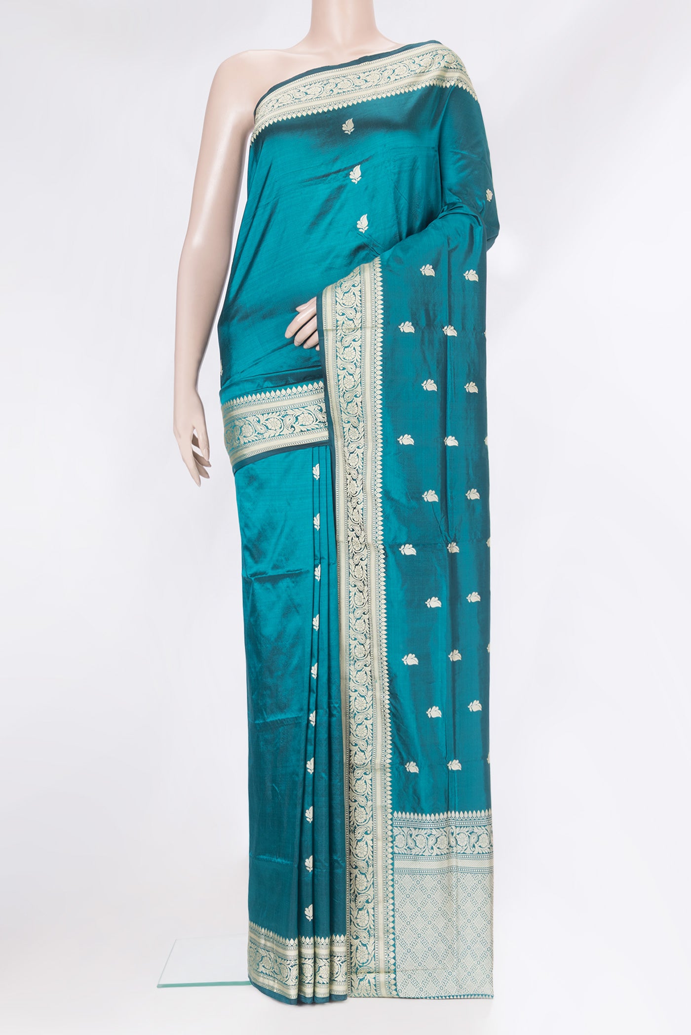 Peacock Blue Dual Tone Banarasi Silk Saree with Thread Butta on the body and Thread Border.  displayed on a mannequin