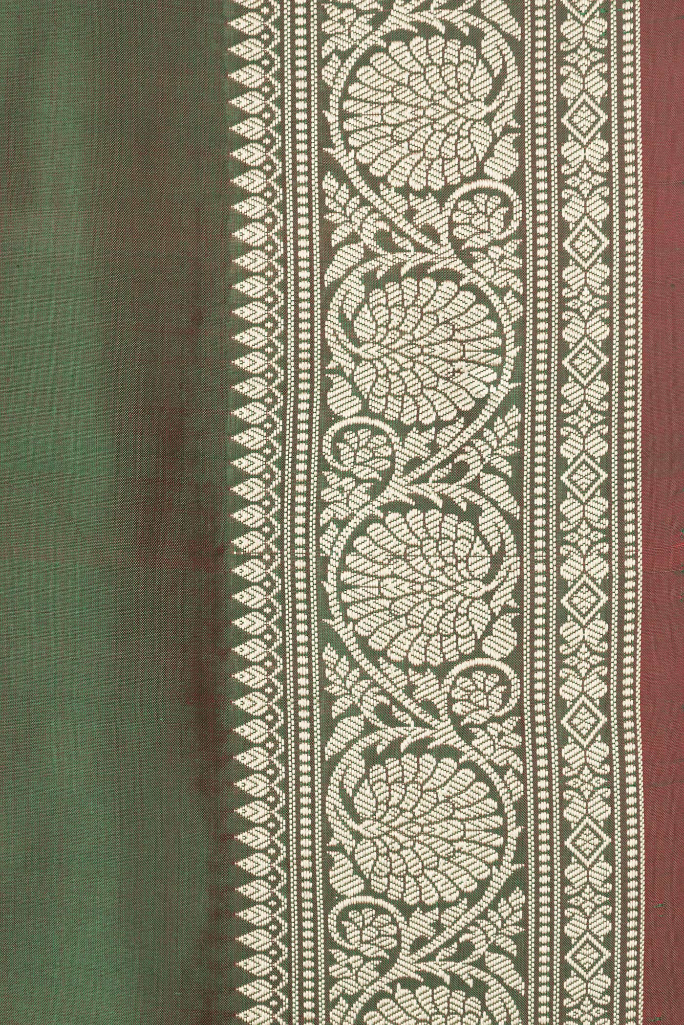 Border image of Green Dual Tone Banarasi Silk Saree with Thread Butta on the body and Thread Border. 