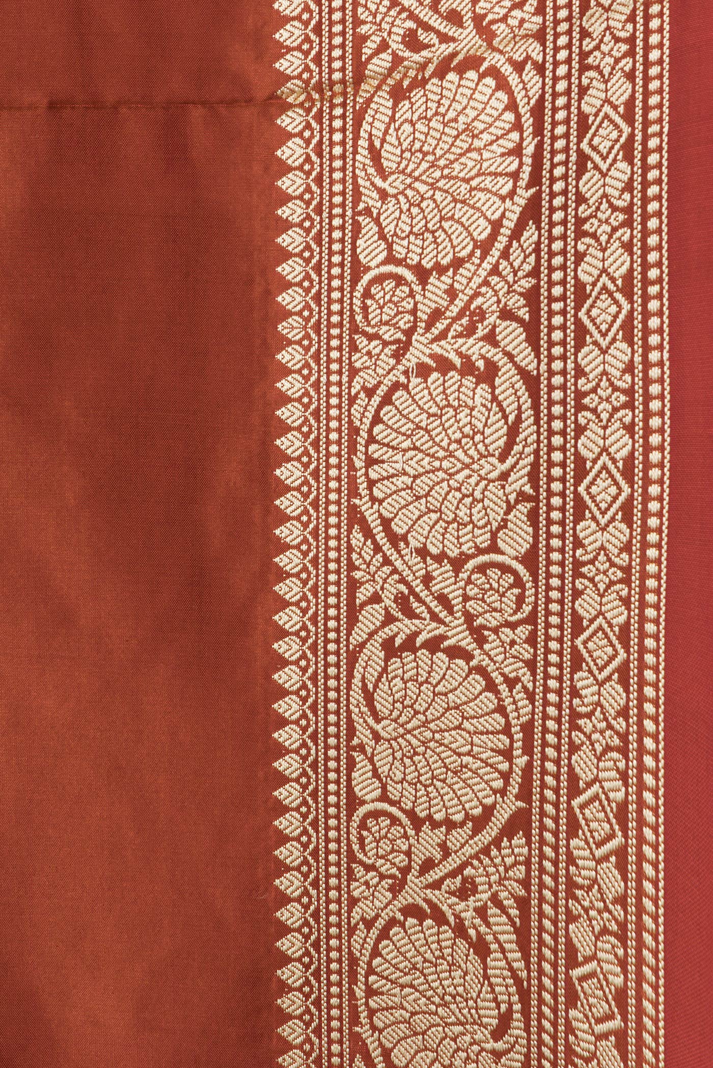 Border image of Orange Dual Tone Banarasi Silk Saree with Thread Butta on the body and Thread Border. 