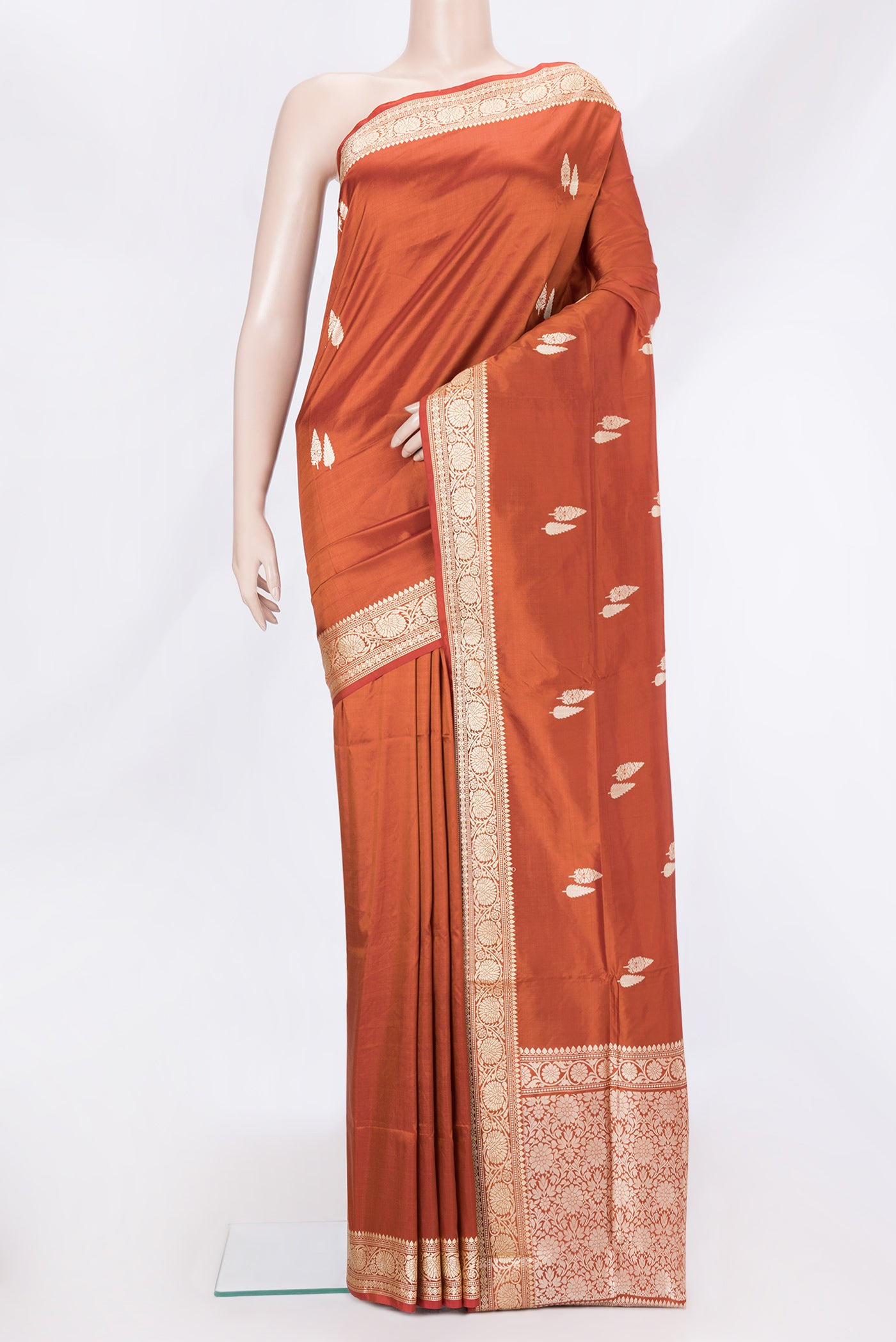 Orange Dual Tone Banarasi Silk Saree with Thread Butta on the body and Thread Border.  displayed on a mannequin