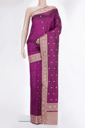 Pure Silk Magenta Banarasi Katan Saree with Thread Butta on the body and Thread Border.  displayed on a mannequin