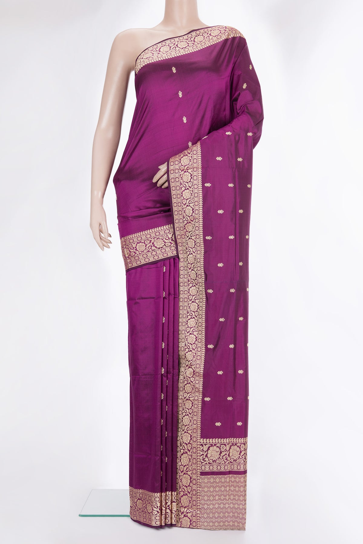 Pure Silk Magenta Banarasi Katan Saree with Thread Butta on the body and Thread Border.  displayed on a mannequin