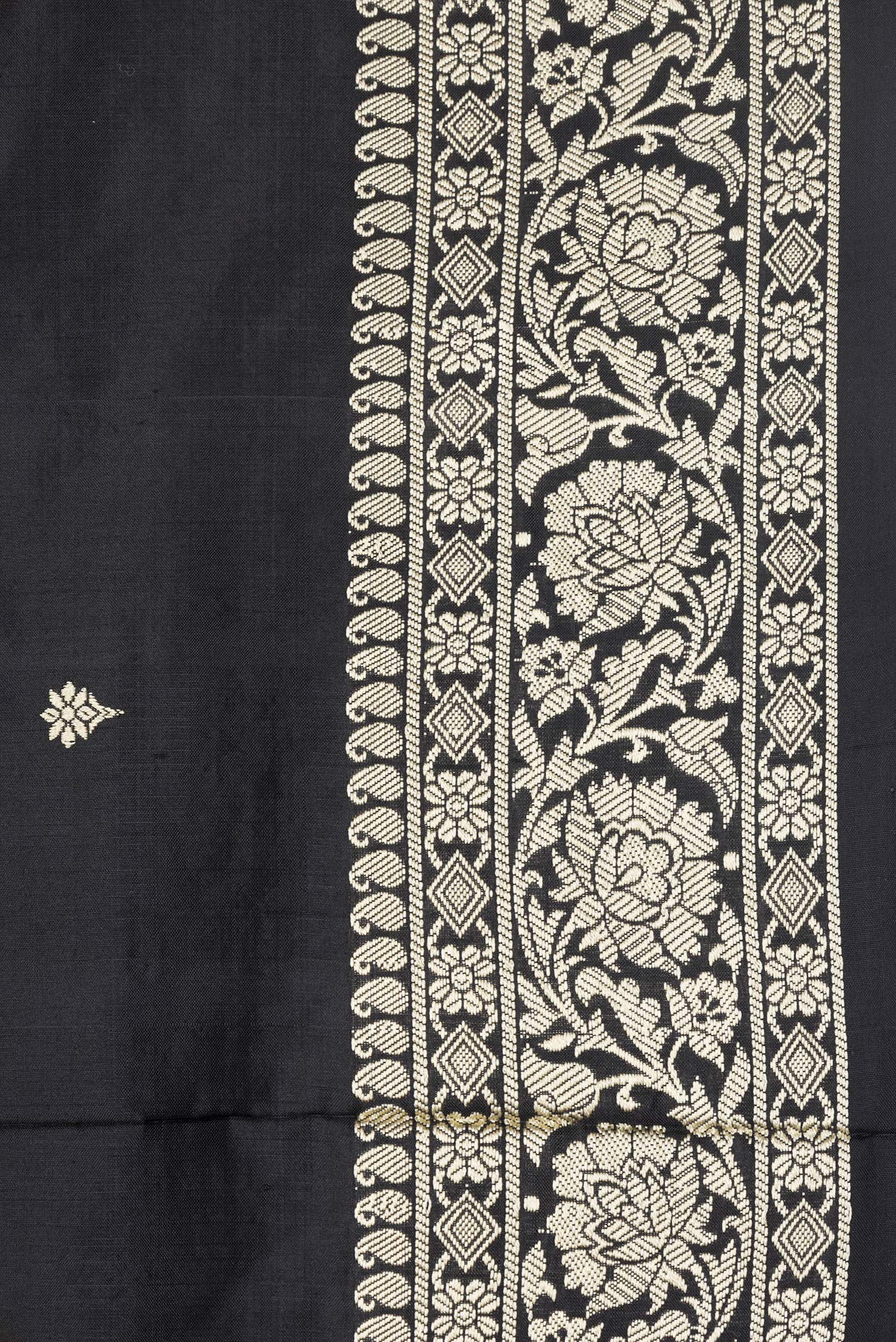 Border image of Black Dual Tone Banarasi Silk Saree with Thread Butta on the body and Thread Border. 
