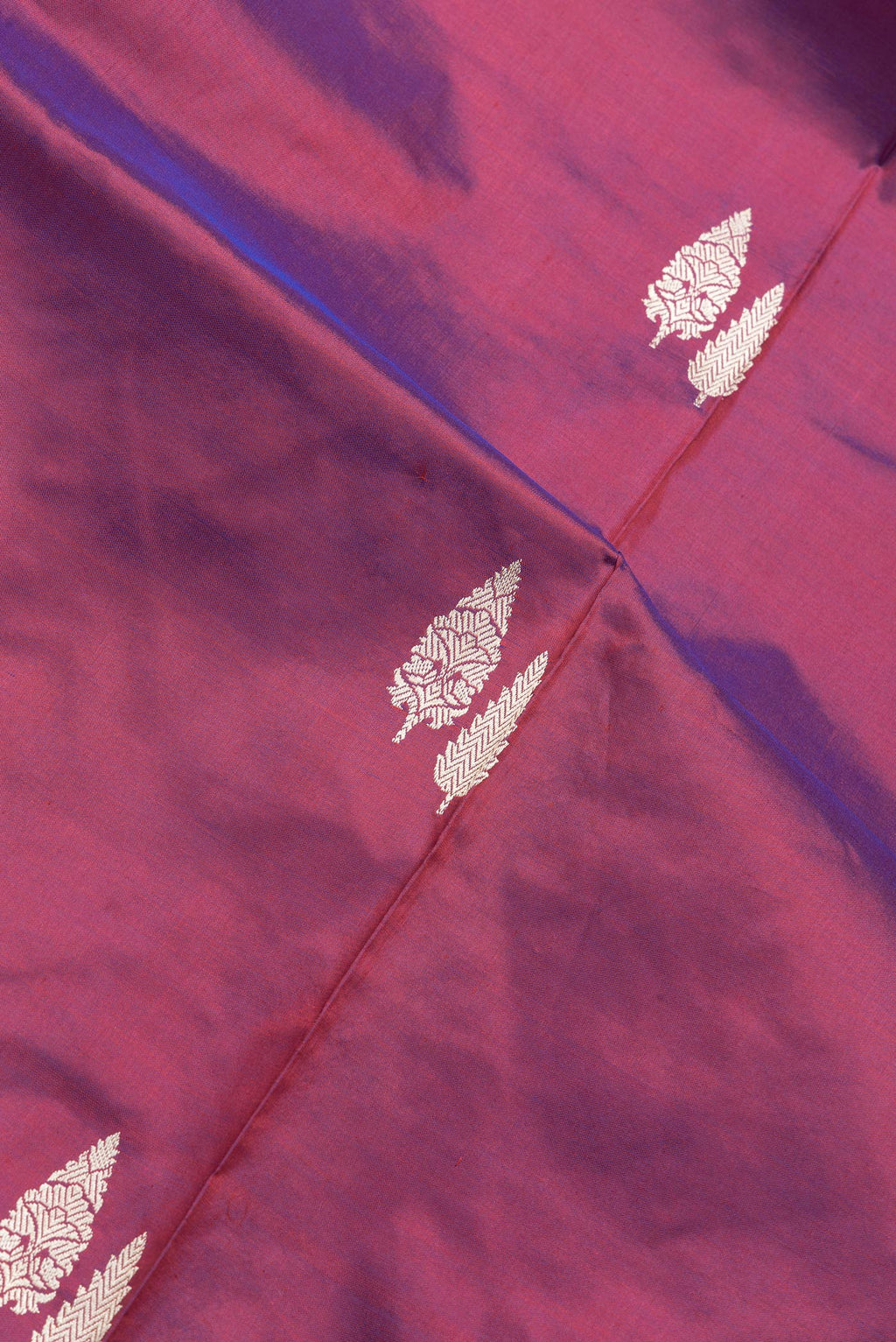 Close up of Purple Dual Tone Banarasi Silk Saree with Thread Butta on the body and Thread Border.  displaying folds