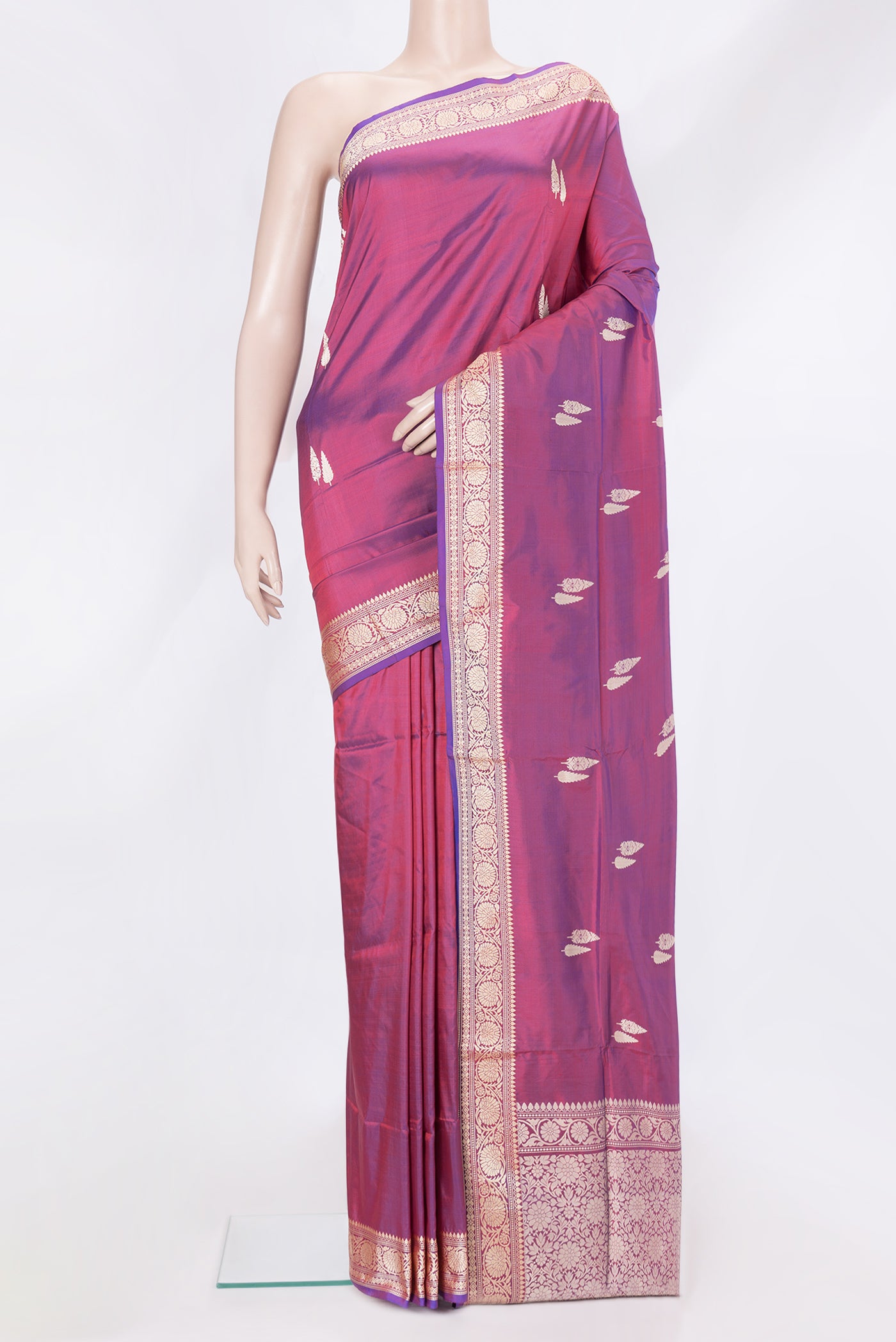 Purple Dual Tone Banarasi Silk Saree with Thread Butta on the body and Thread Border.  displayed on a mannequin