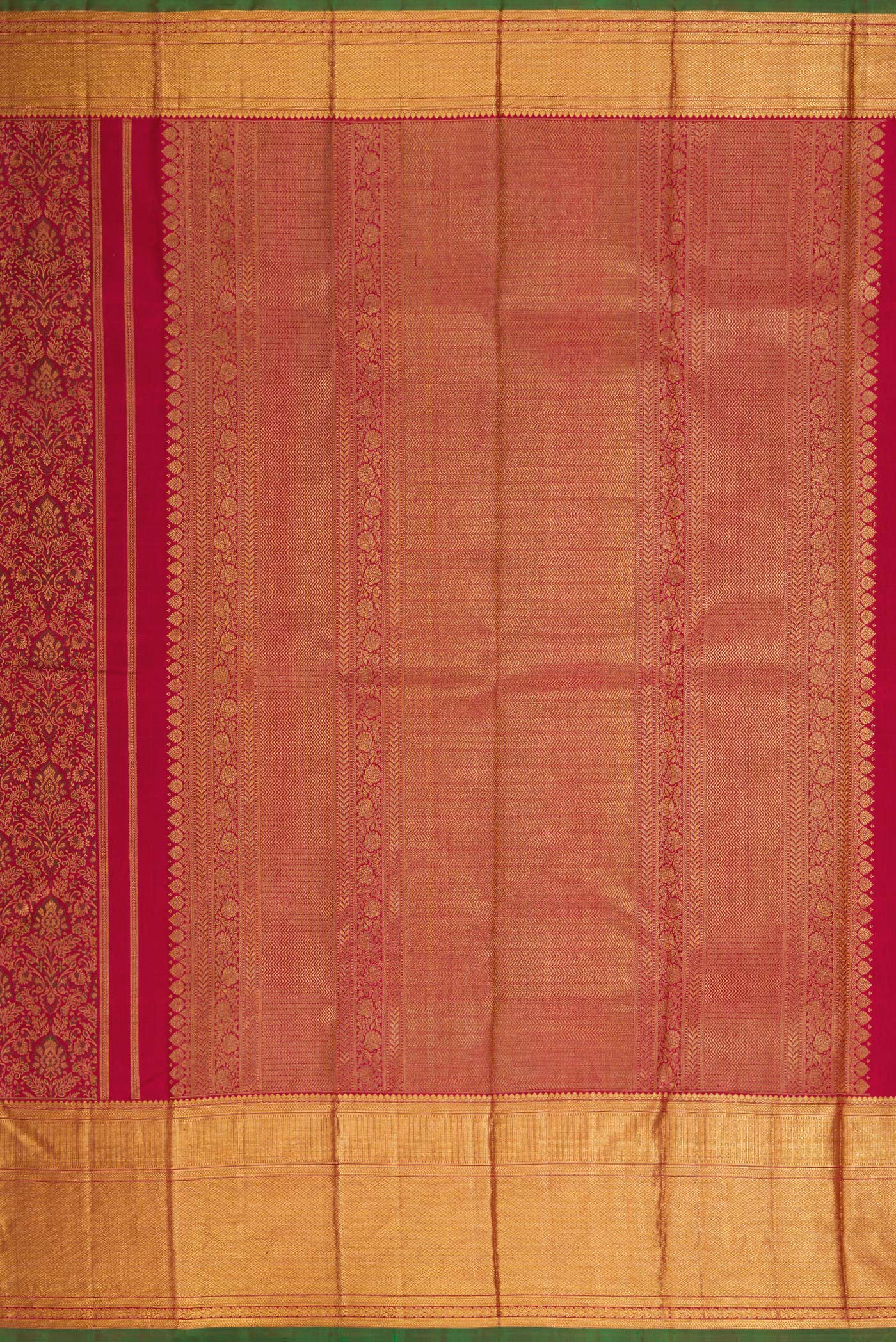 Close up image of the pallu of Maroon Dual Tone Kanchipuram Silk Saree with Zari Brocade on the body and Zari Border. 