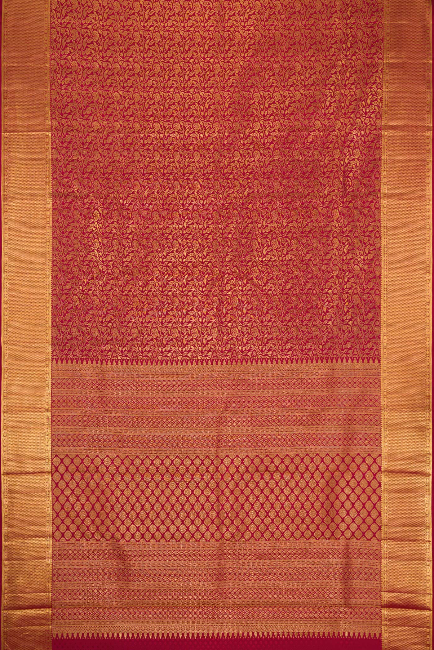 Flat view of Maroon Dual Tone Kanjivaram Silk Saree with Zari Brocade on the body and Zari Border. 