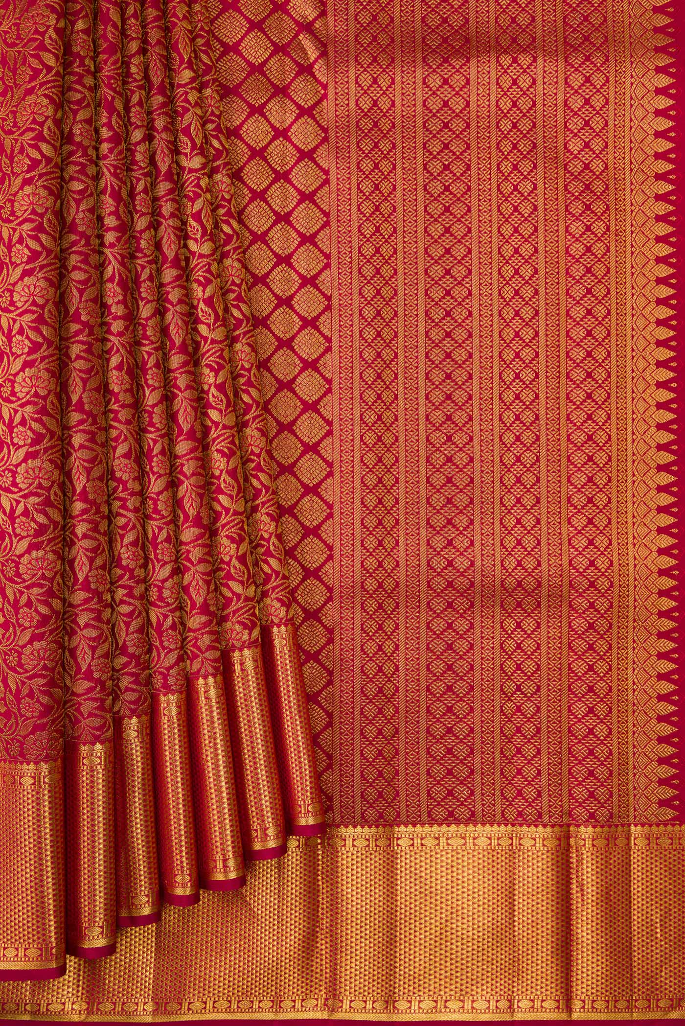 Pleats and pallu of Maroon Dual Tone Kanjivaram Silk Saree with Zari Brocade on the body and Zari Border. 