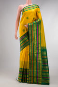 Pure Silk Pure Zari Yellow Dual Tone Kanchipuram Saree with Zari And Thread Butta on the body and Fancy Border.  displayed on a mannequin