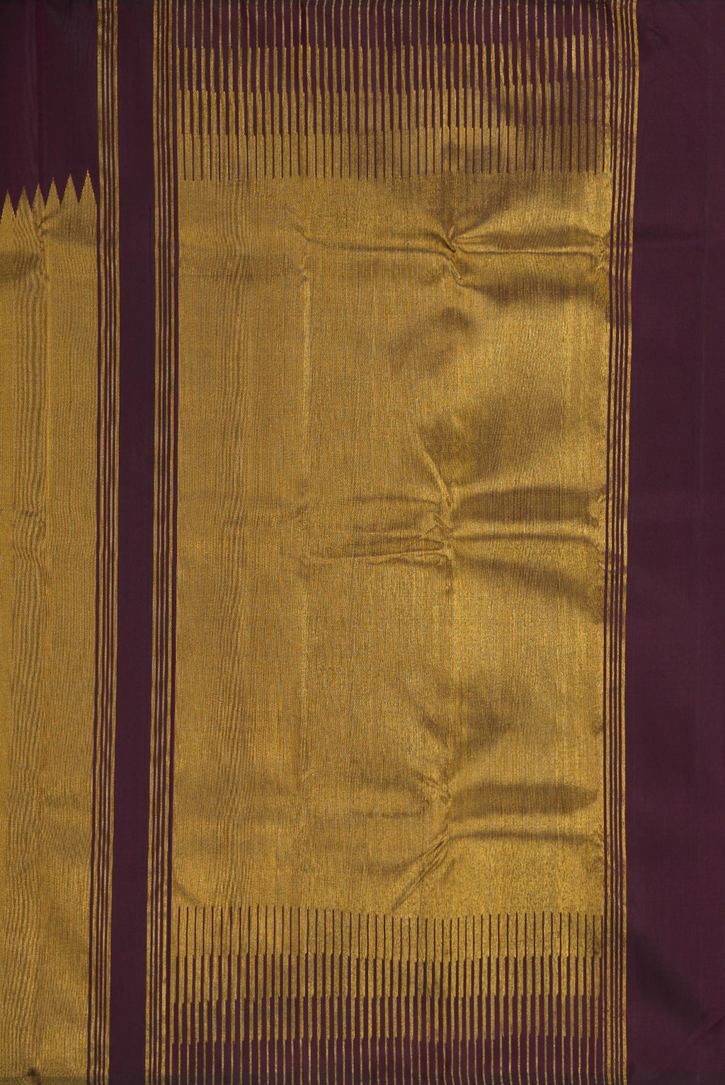 Close up image of the pallu of Burgundy Dual Tone Kanjivaram Silk Saree with Plain Body and Rising Temple Border. 