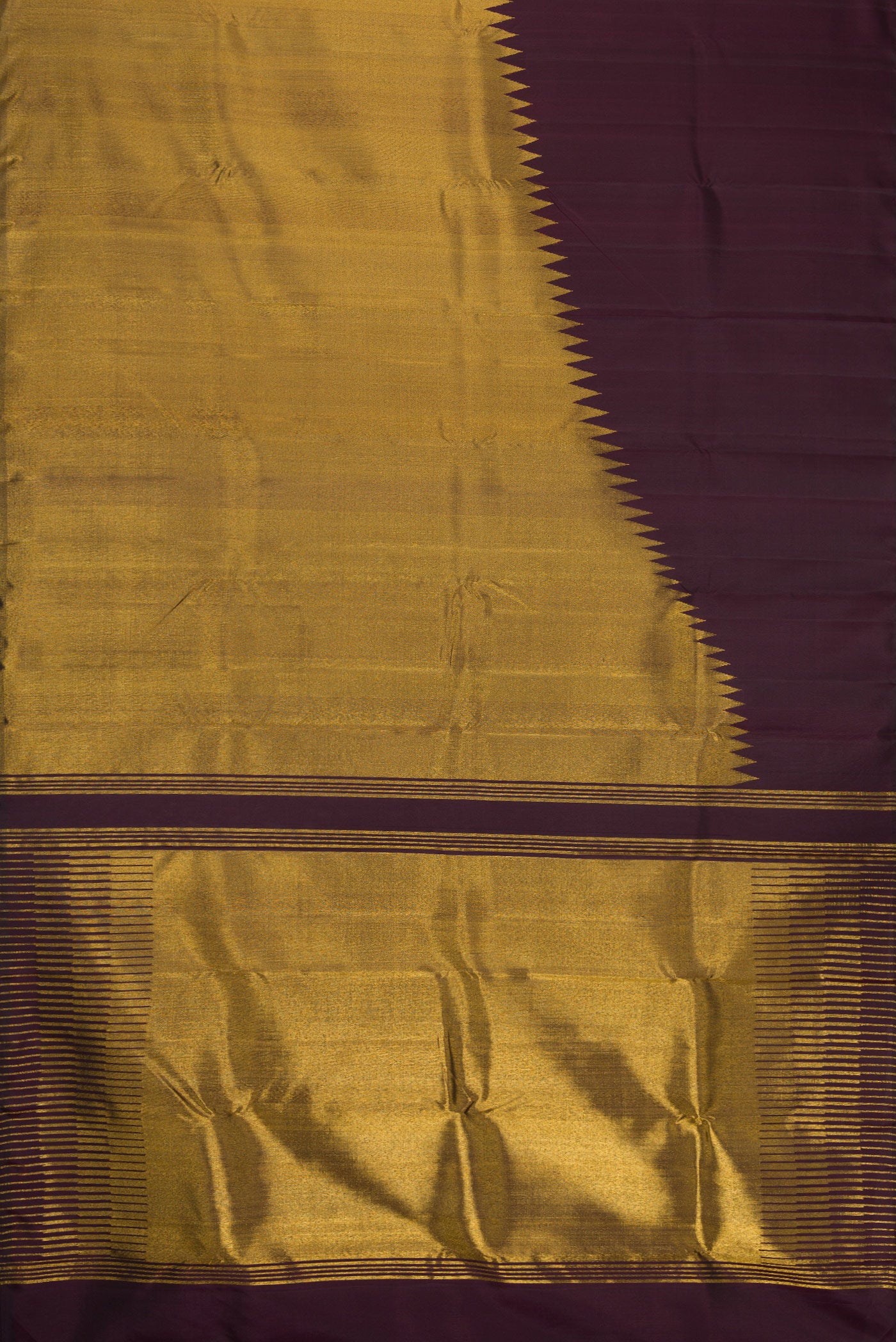 Flat view of Burgundy Dual Tone Kanjivaram Silk Saree with Plain Body and Rising Temple Border. 