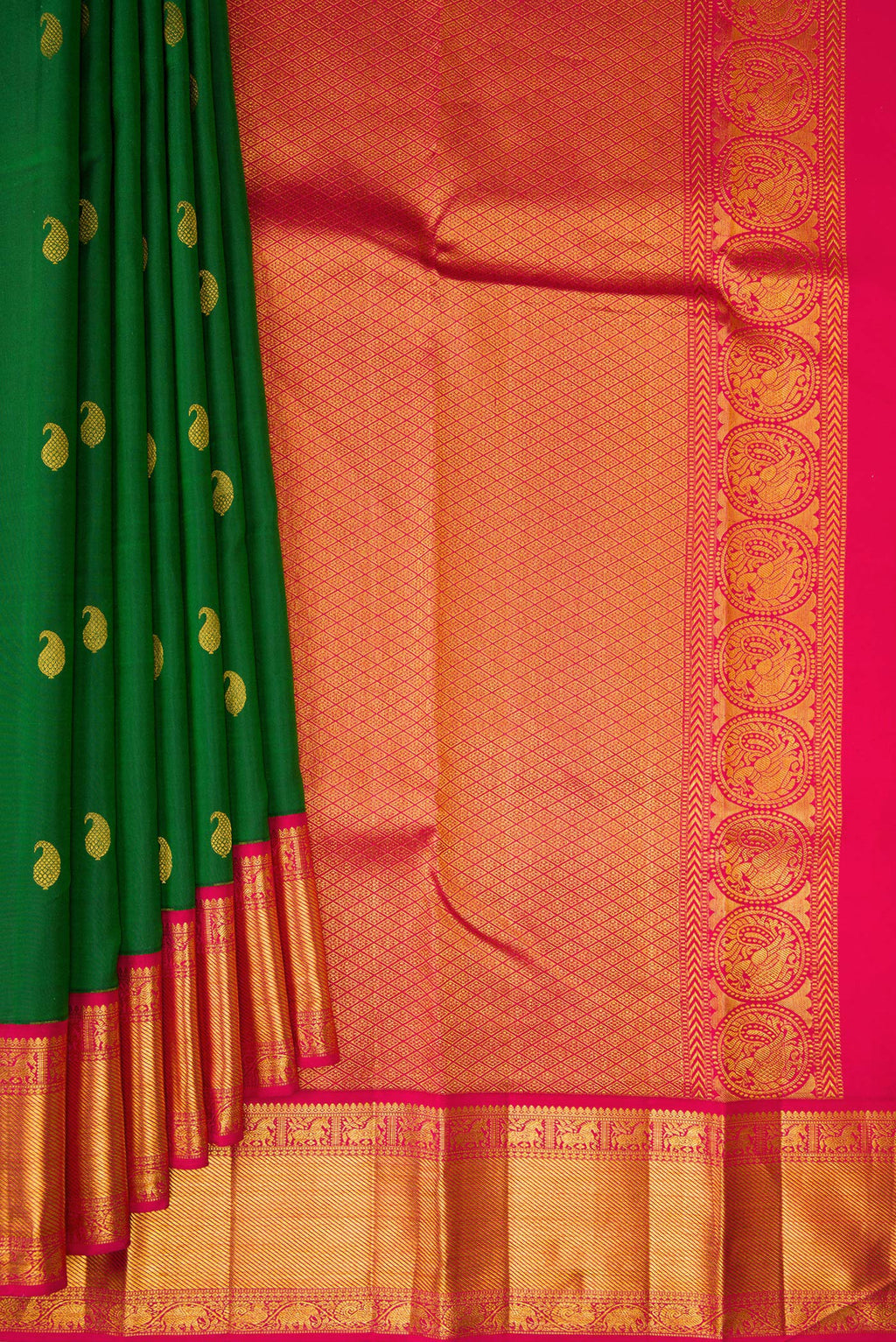 Pleats and pallu of Pure Silk Bottle Green Kanjivaram Saree with Zari Butta on the body and Ganga Jamuna Border. 