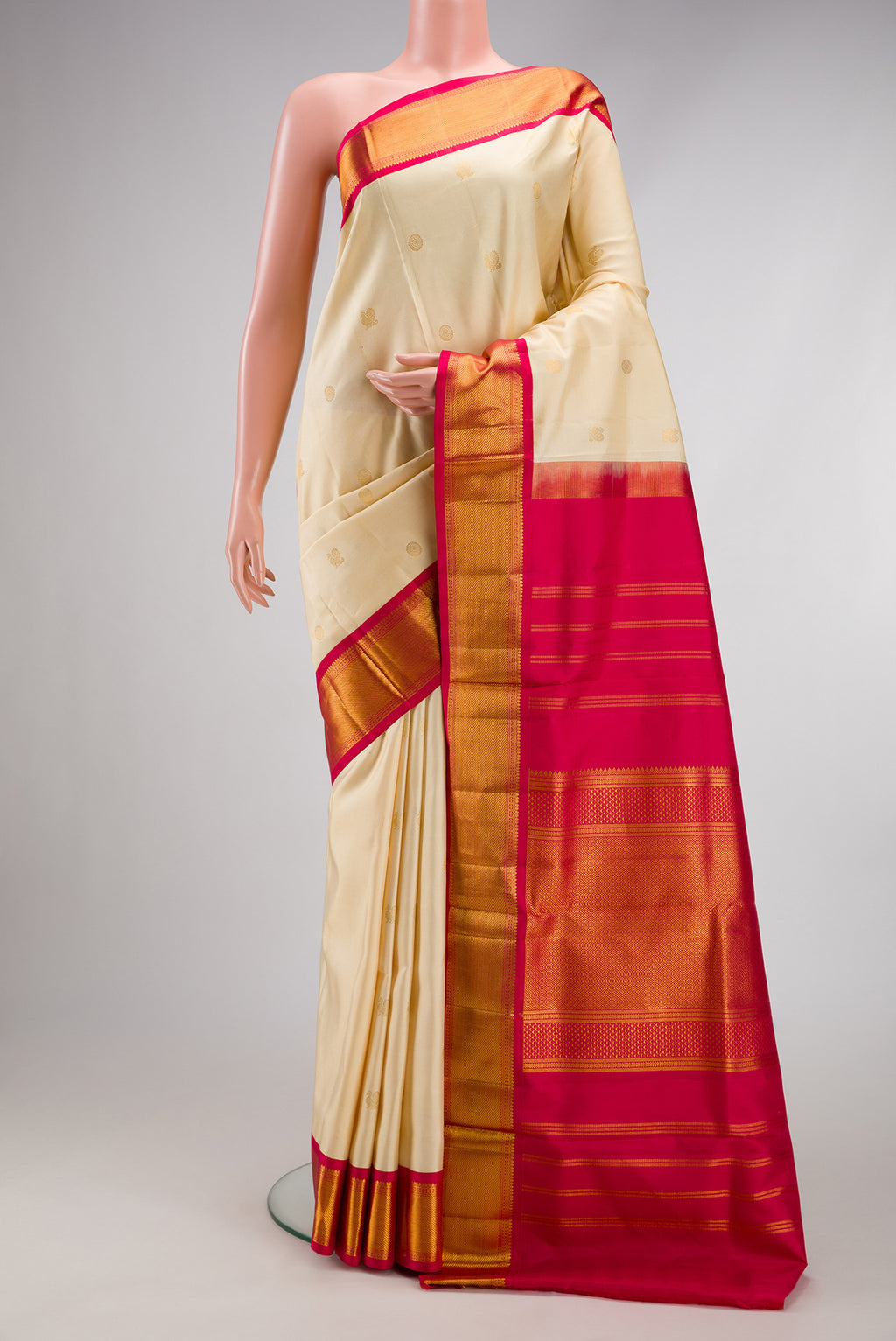 Sandal Kanjivaram Silk Nine Yards Saree with Zari Butta on the body and Zari Border.  displayed on a mannequin