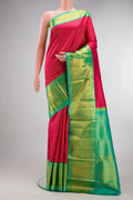 Pure Silk Pink Kanjivaram Saree with Zari Brocade on the body and Zari Border.  displayed on a mannequin