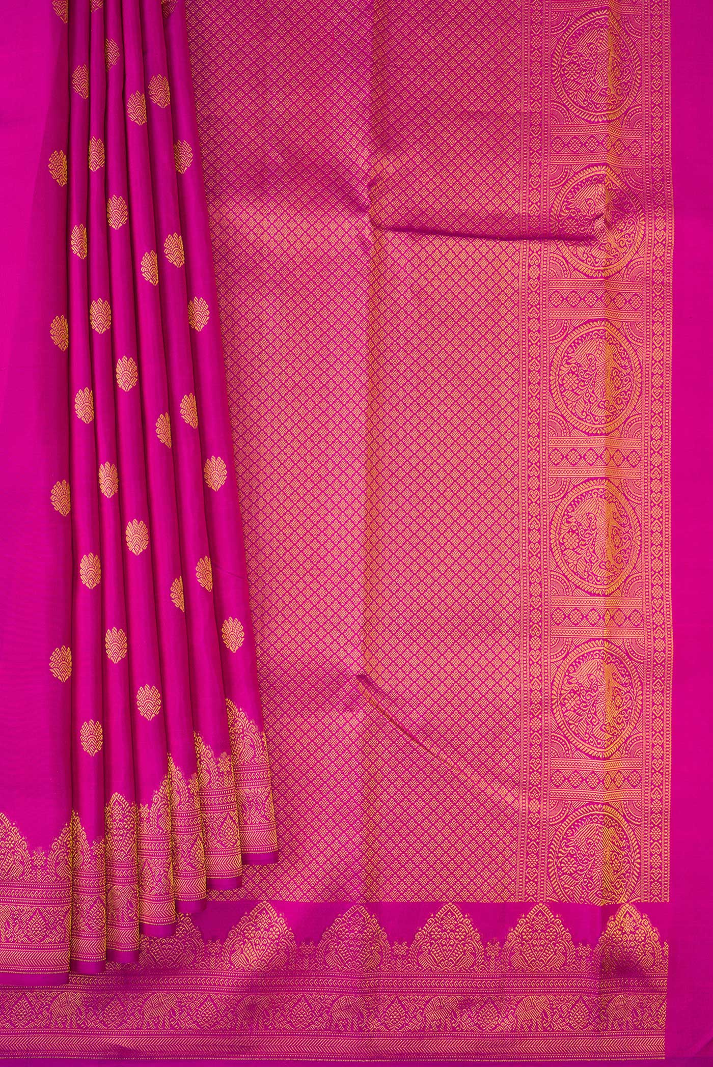 Pleats and pallu of Magenta Kanchipuram Silk Saree with Zari Butta on the body and Fancy Border. 