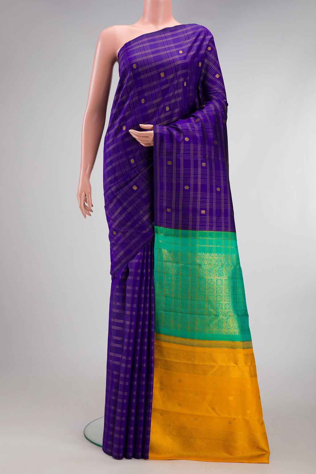 Dark Blue Kanchipuram Silk Saree with Checked design on the body and Without Border.  displayed on a mannequin