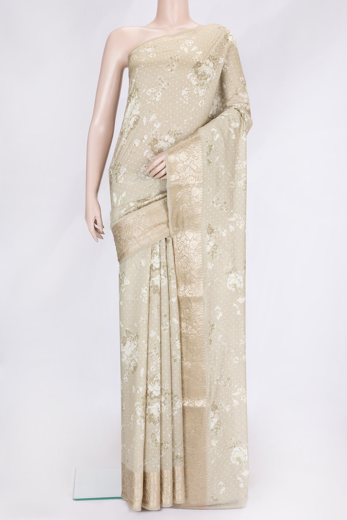 Pista Green Dual Tone Tussar Silk Saree with Printed design on the body and Zari Border.  displayed on a mannequin