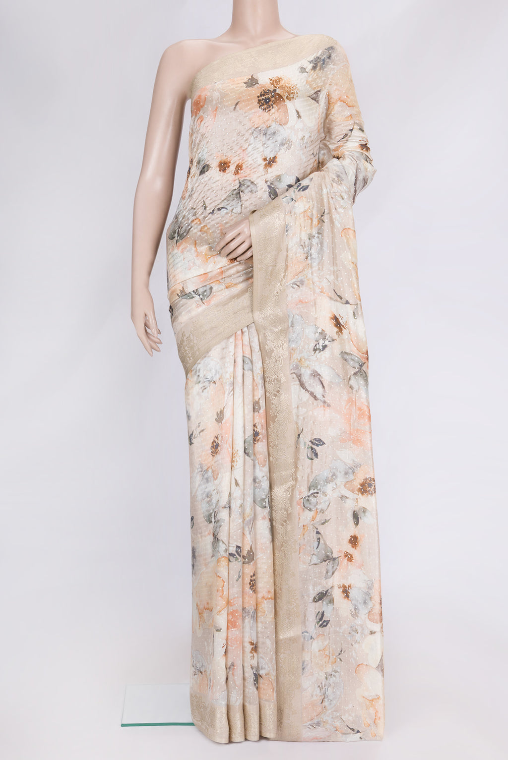 Rose Gold Dual Tone Tussar Silk Saree with Printed design on the body and Zari Border.  displayed on a mannequin