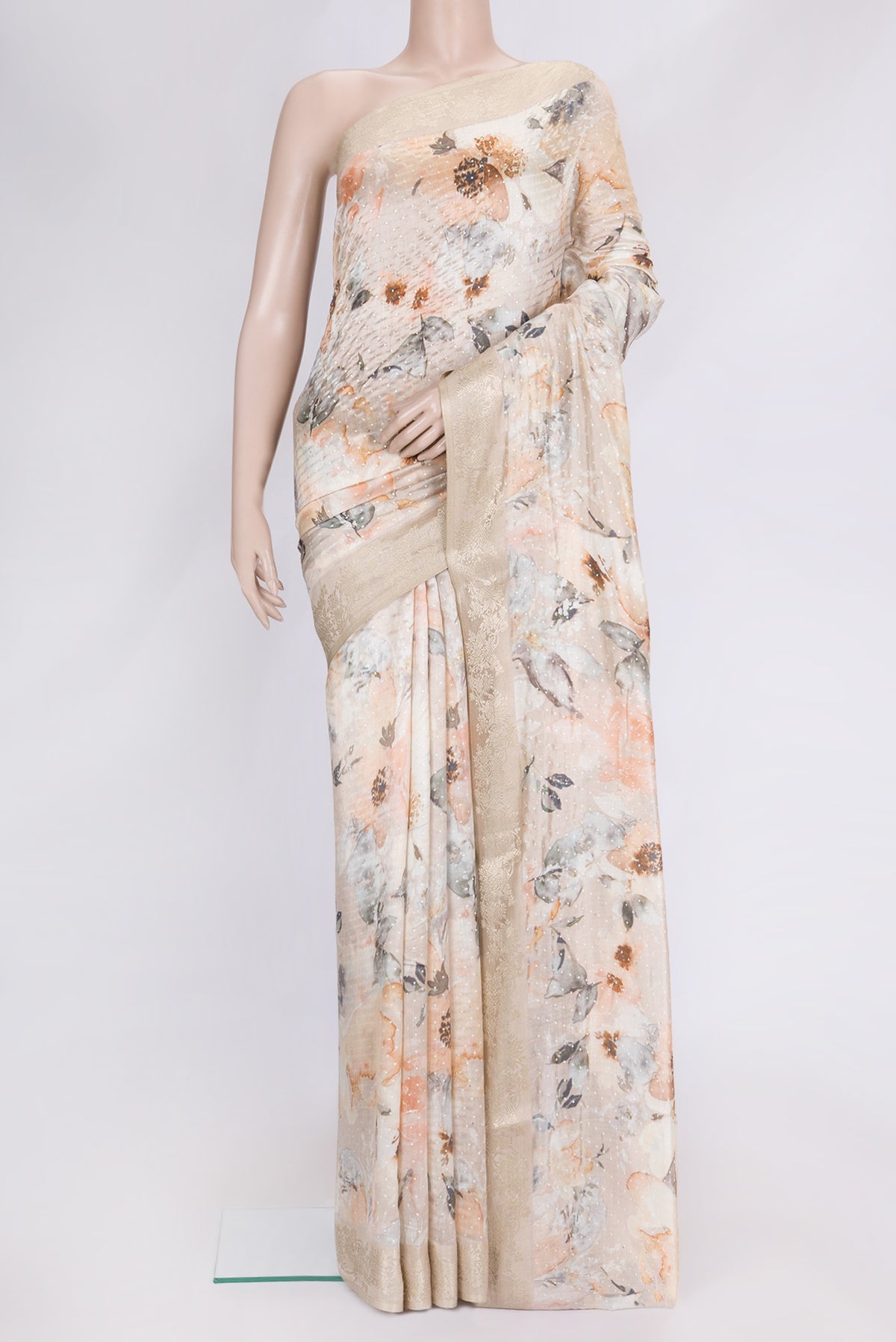 Rose Gold Dual Tone Tussar Silk Saree with Printed design on the body and Zari Border.  displayed on a mannequin
