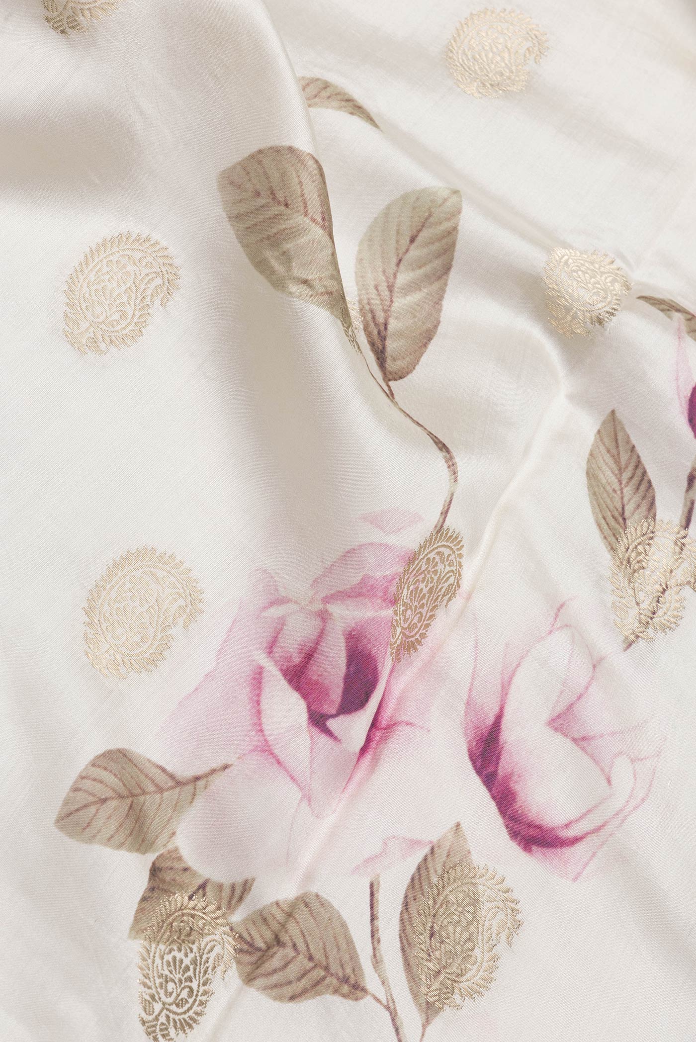 Close up of Beige Dual Tone Chanderi Silk Saree with Zari Butta on the body and Zari Border.  displaying folds