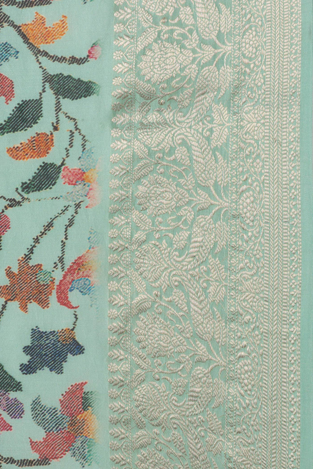 Border image of Sea Green Dual Tone Chanderi Silk Saree with Printed design on the body and Zari Border. 