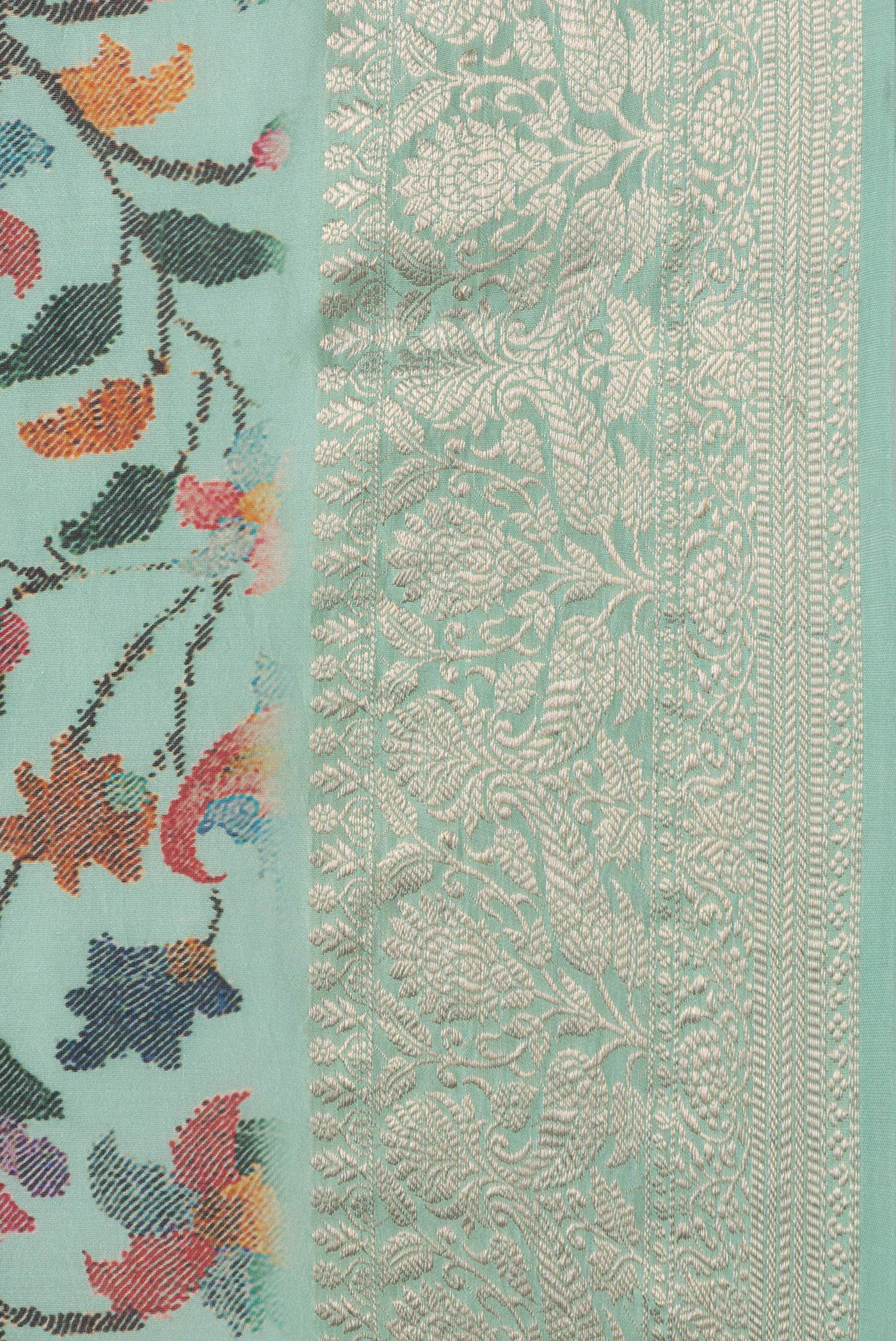 Border image of Sea Green Dual Tone Chanderi Silk Saree with Printed design on the body and Zari Border. 