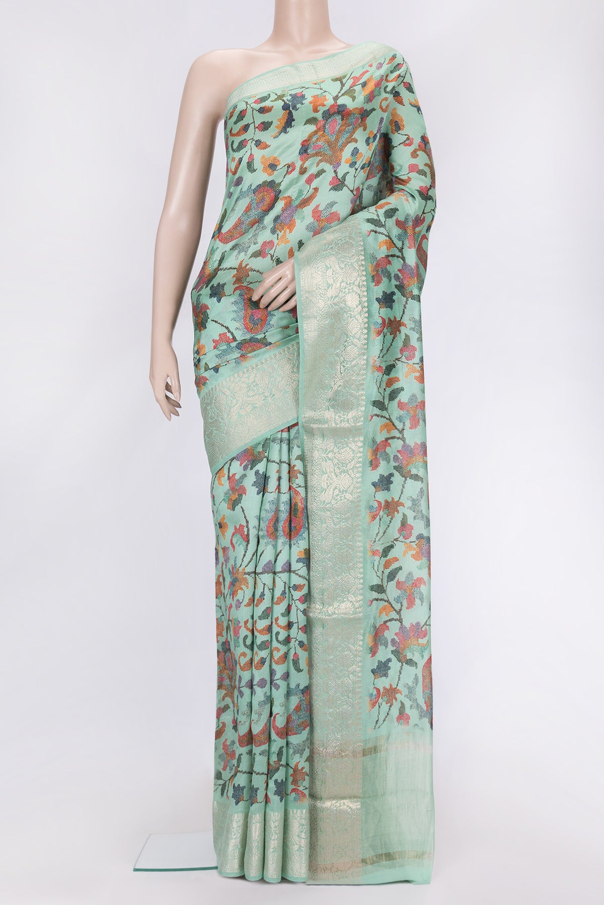 Sea Green Dual Tone Chanderi Silk Saree with Printed design on the body and Zari Border.  displayed on a mannequin