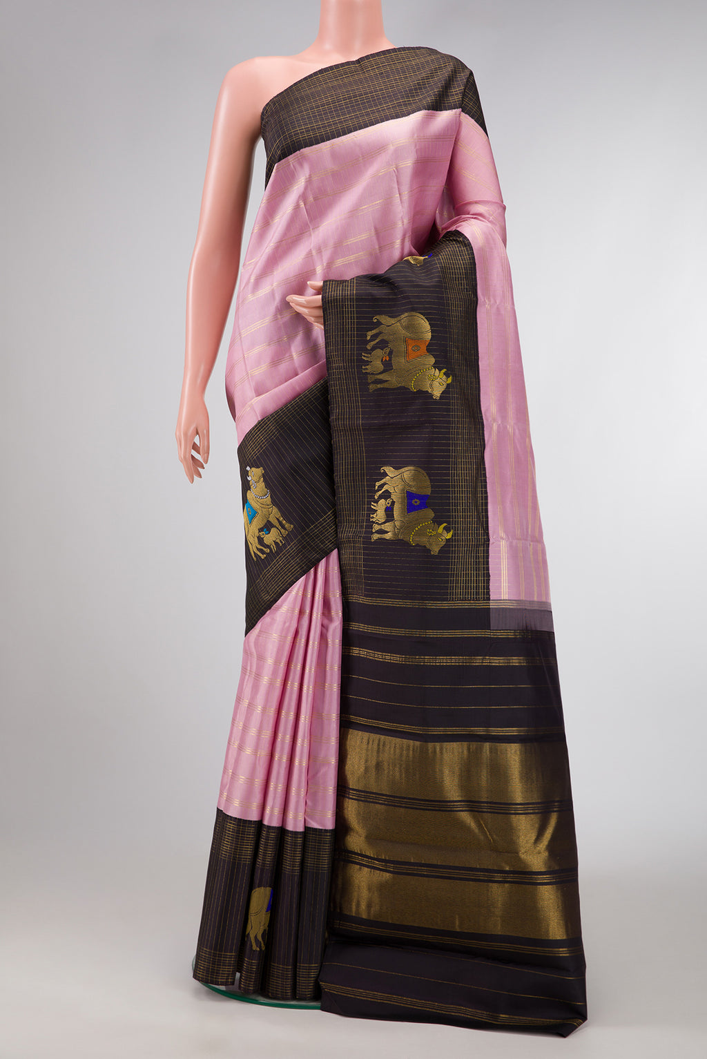 Pink Dual Tone Kanchipuram Silk Saree with Checked design on the body and Fancy Border.  displayed on a mannequin