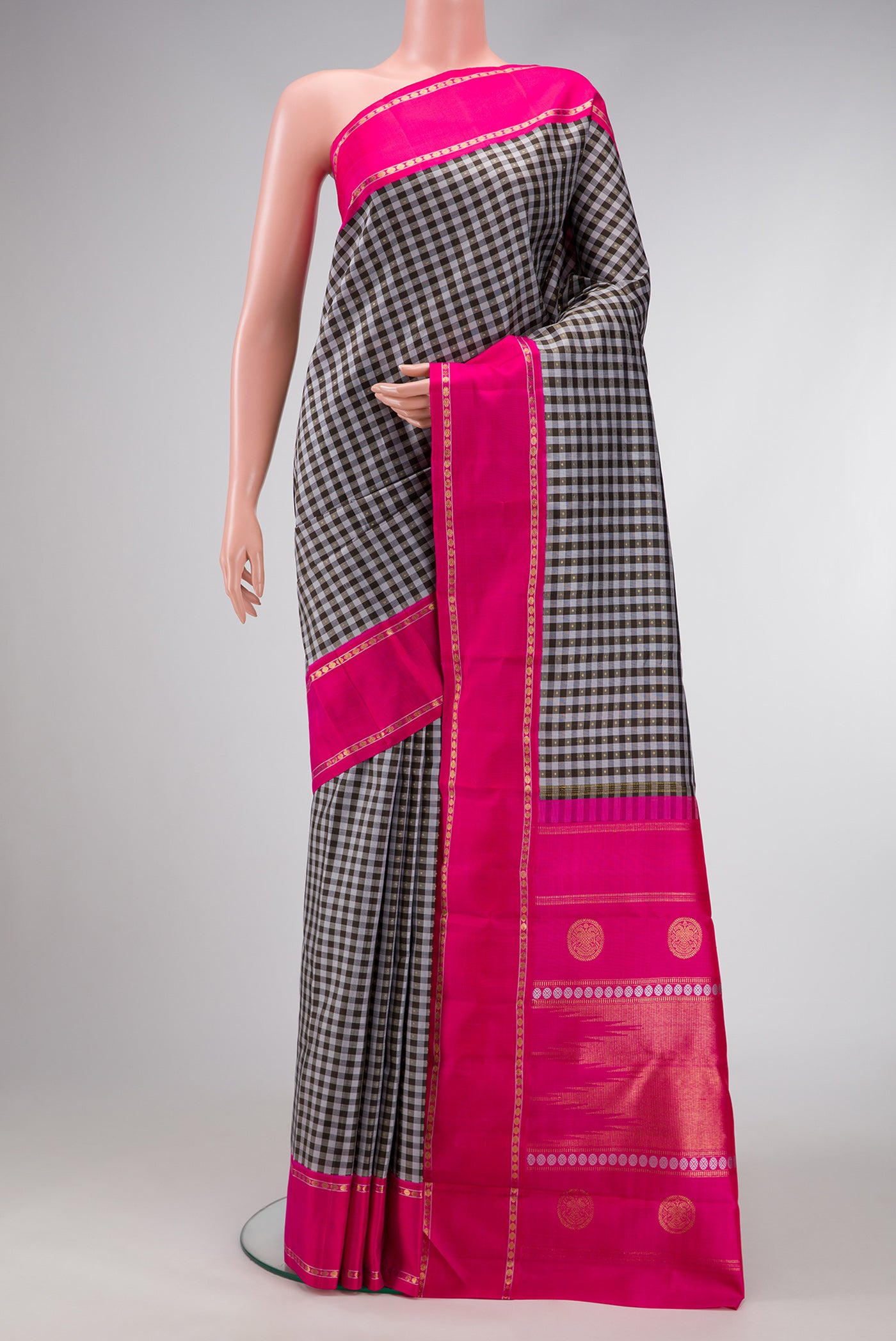 Pure Silk Pure Zari Black and Grey Color Kanjivaram Saree with Checked design on the body and Zari Border.  displayed on a mannequin