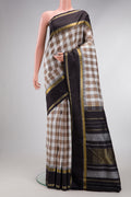 Pure Silk Pure Zari Beige and Off White Color Kanchipuram Saree with Checked design on the body and Zari Border.  displayed on a mannequin