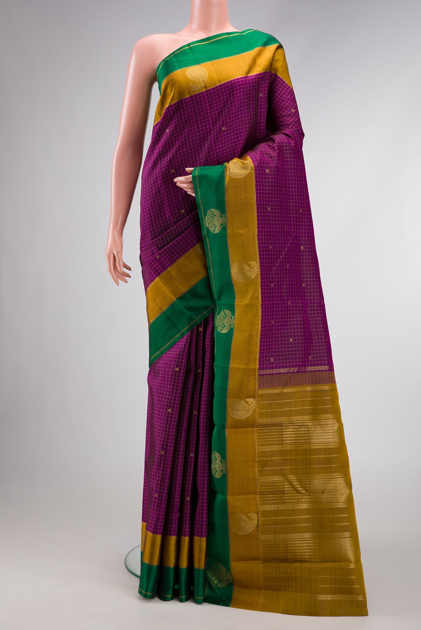 Pure Silk Pure Zari Burgundy Dual Tone Kanchipuram Saree with Checked design on the body and Fancy Border.  displayed on a mannequin