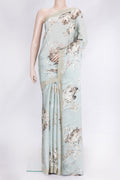 Light Green Dual Tone Mysore Crepe Saree with Printed design on the body and Embroidery Border.  displayed on a mannequin