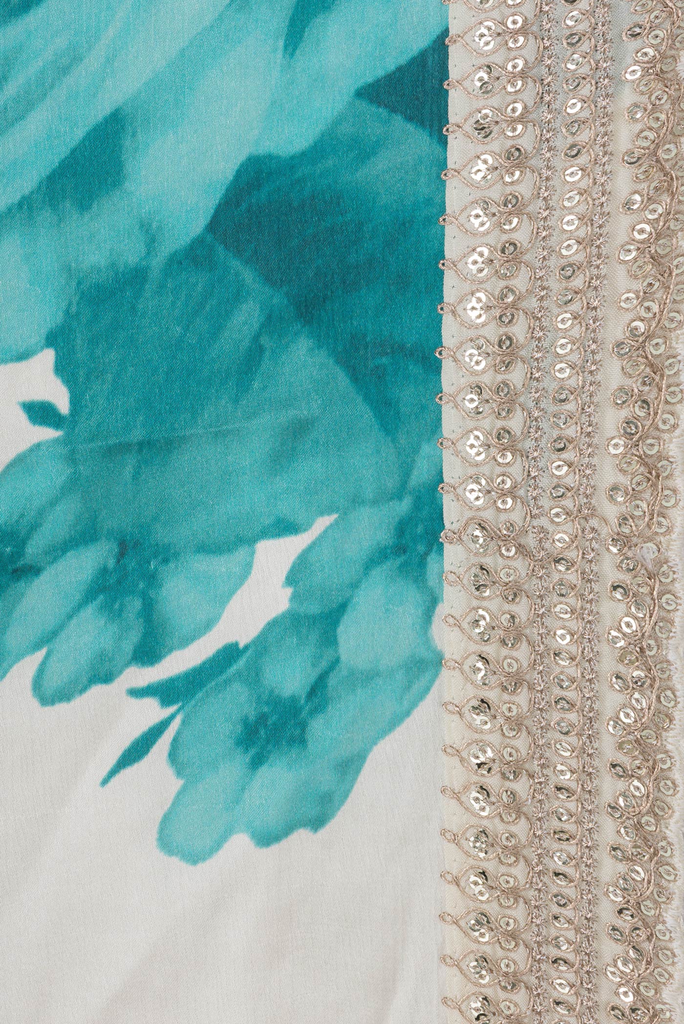 Border image of Off White Dual Tone Mysore Crepe Saree with Printed design on the body and Embroidery Border. 