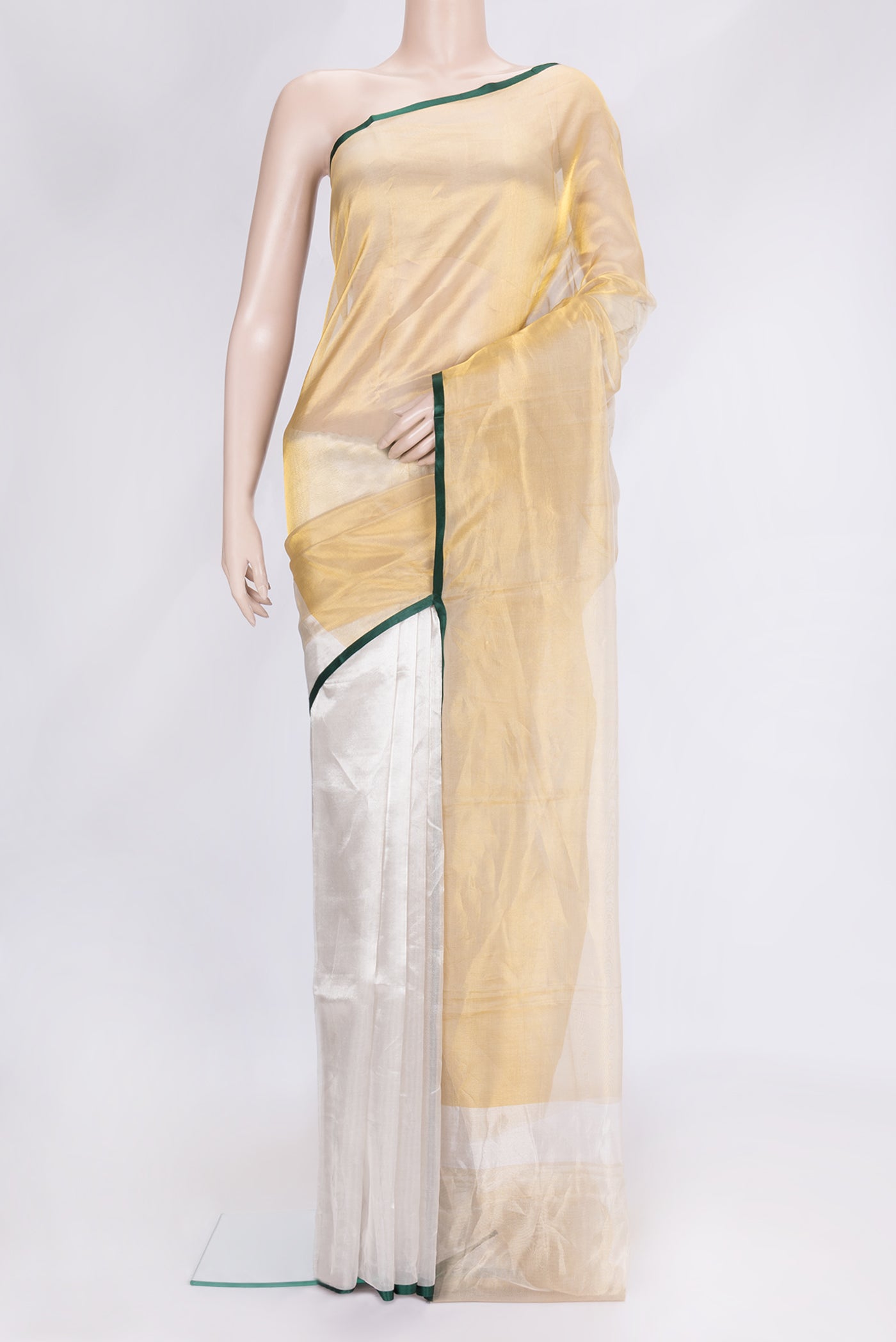 Mustard Dual Tone Mysore Crepe Saree with Printed design on the body and Embroidery Border.  displayed on a mannequin