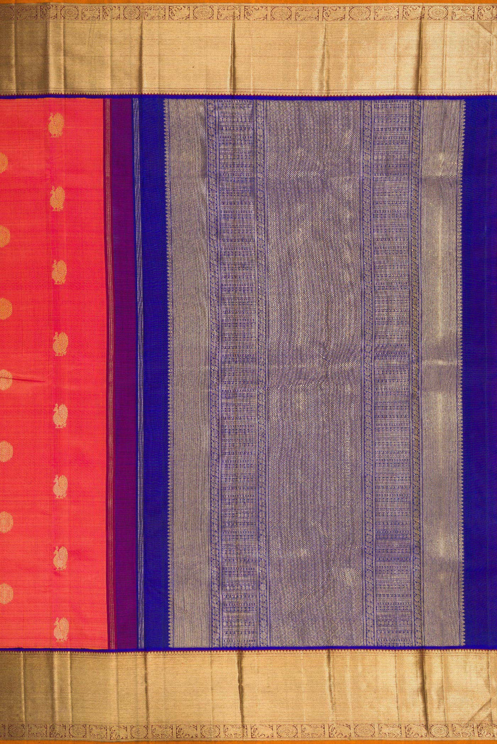 Close up image of the pallu of Pure Silk Pure Zari Coral Dual Tone Kanjivaram Saree with Zari Butta on the body and Zari Border. 