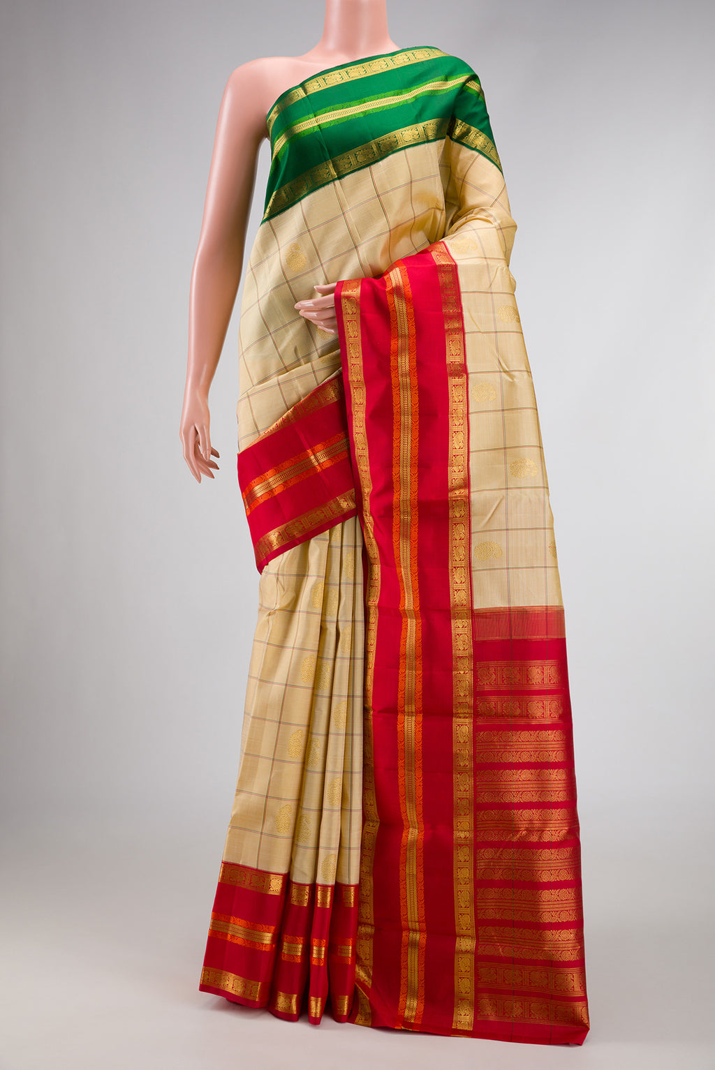 Pure Silk Pure Zari Sandal Dual Tone Kanchipuram Saree with Checked design on the body and Ganga Jamuna Border.  displayed on a mannequin