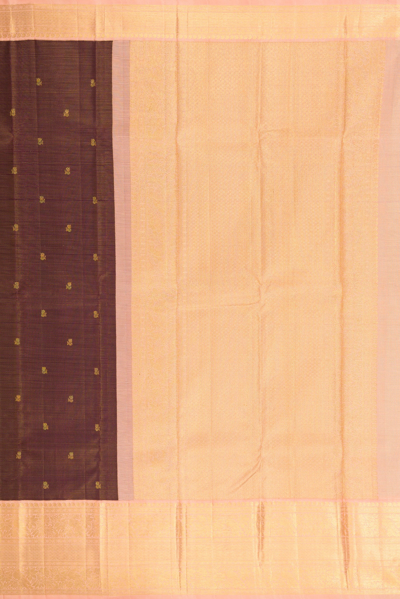 Close up image of the pallu of Coffee Brown Kanchipuram Silk Saree with Zari Butta on the body and Zari Border. 