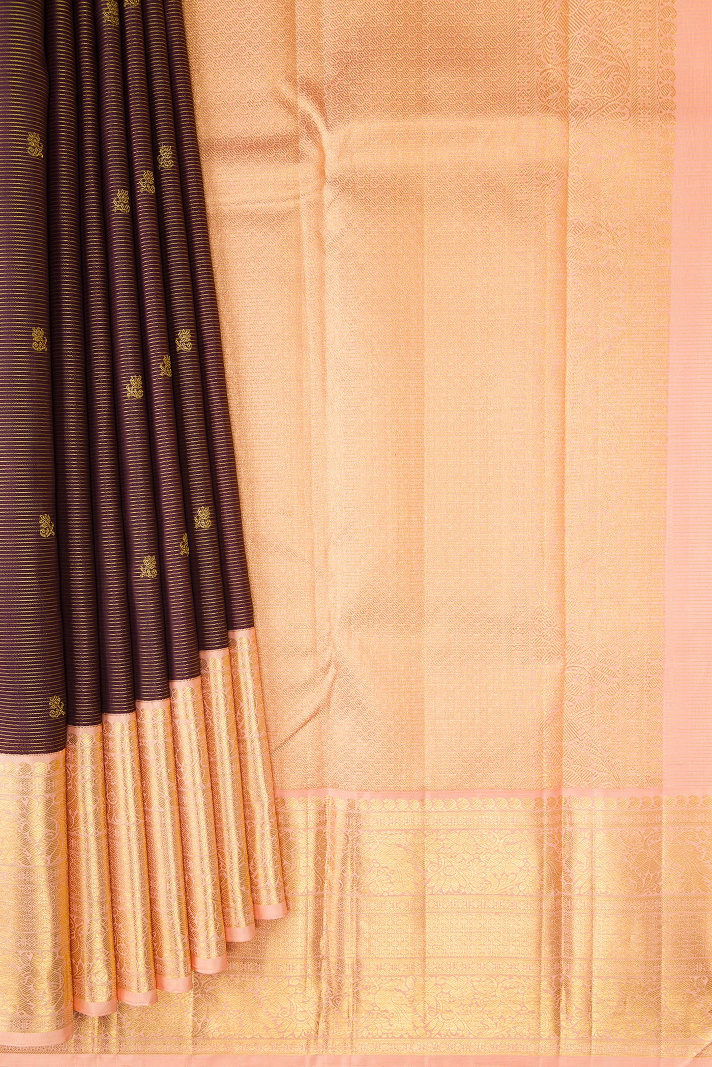 Pleats and pallu of Coffee Brown Kanchipuram Silk Saree with Zari Butta on the body and Zari Border. 