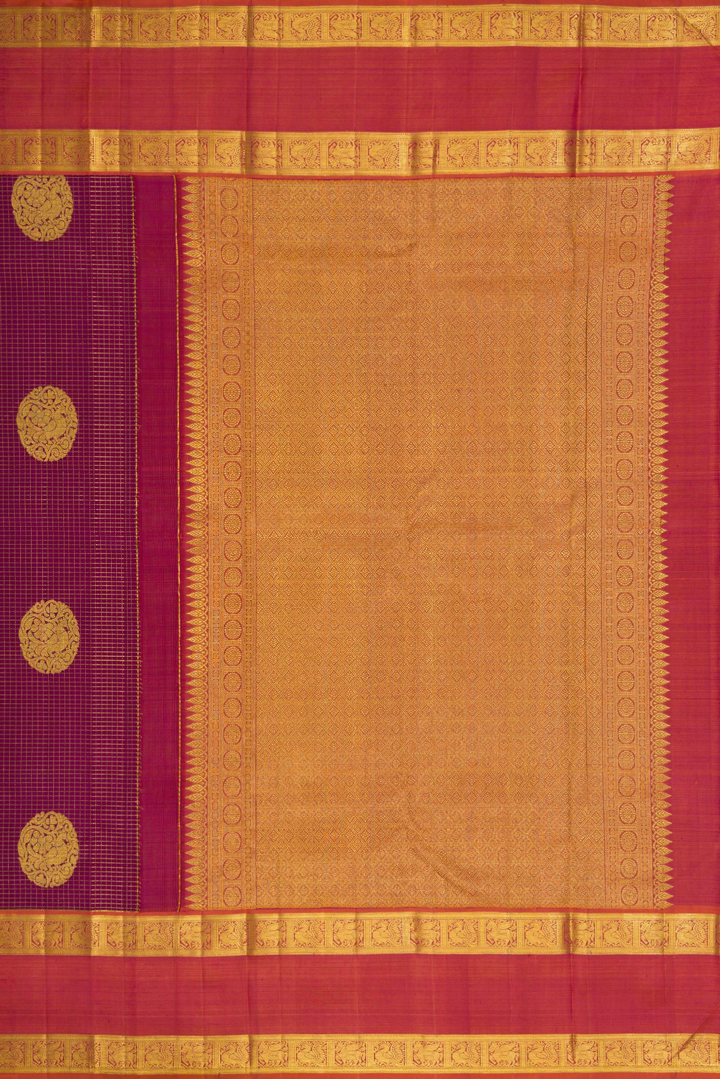 Close up image of the pallu of Purple Dual Tone Kanjivaram Silk Saree with Checked design on the body and Zari Border. 