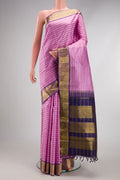 Lavender Kanchipuram Silk Saree with Stripes on the body and Zari Border.  displayed on a mannequin