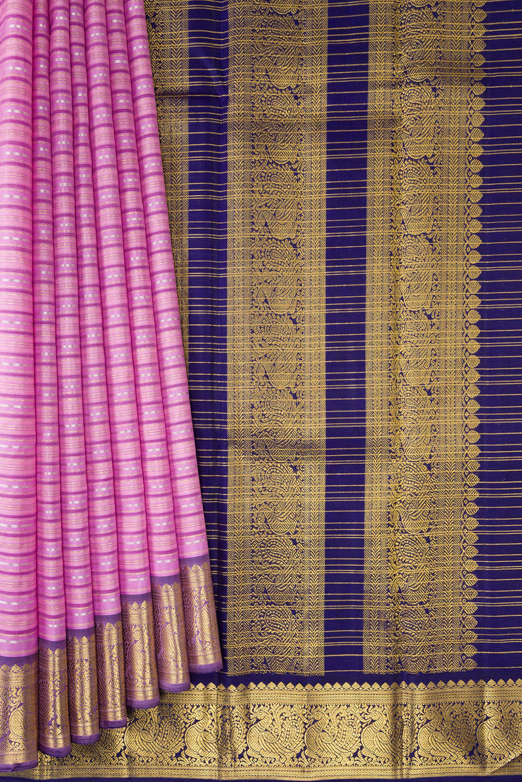 Pleats and pallu of Lavender Kanchipuram Silk Saree with Stripes on the body and Zari Border. 