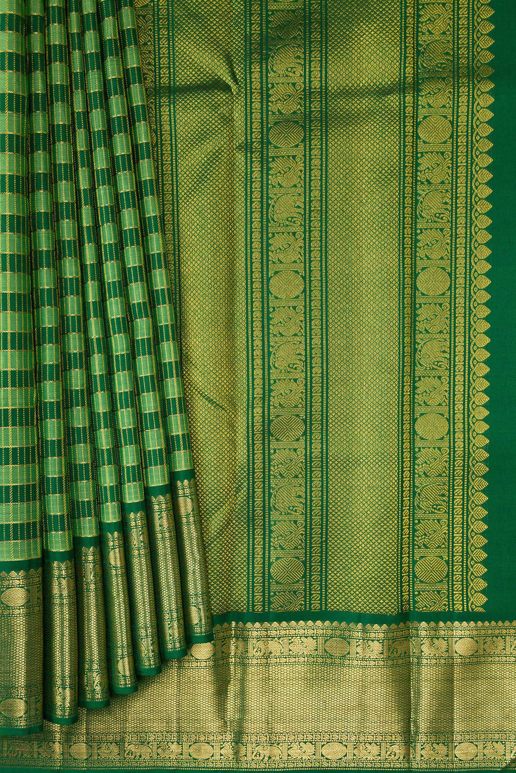 Pleats and pallu of Green Kanchipuram Silk Saree with Stripes on the body and Zari Border. 
