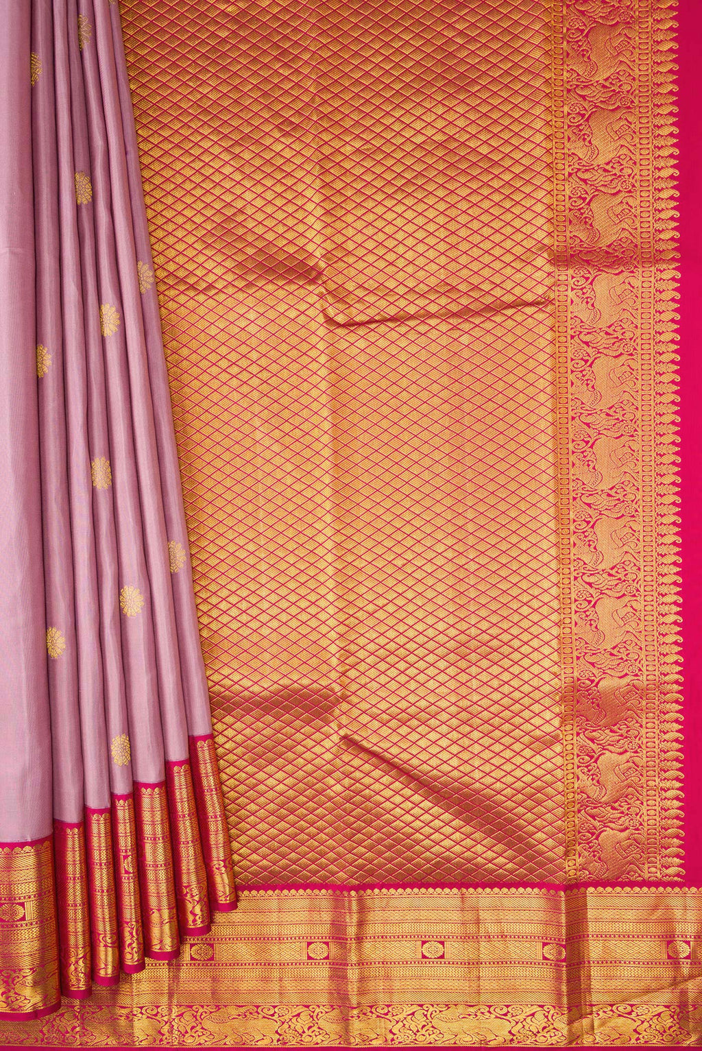 Pleats and pallu of Lavender Kanjivaram Silk Saree with Zari Butta on the body and Ganga Jamuna Border. 