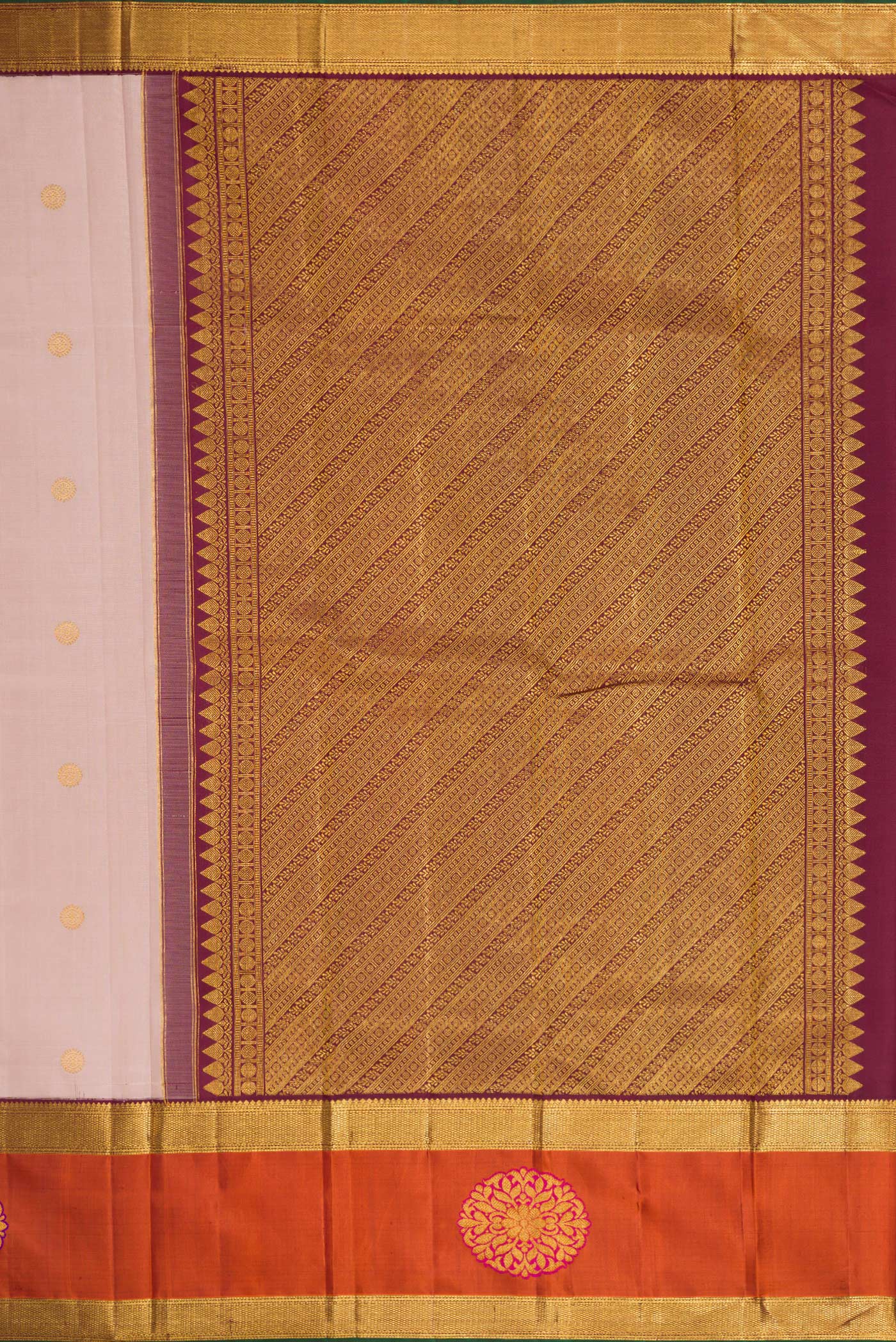 Close up image of the pallu of Rose Gold Dual Tone Kanjivaram Silk Saree with Zari Butta on the body and Fancy Border. 
